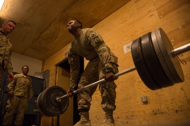 MPs raise the bar, join '1,000 lb. Club'